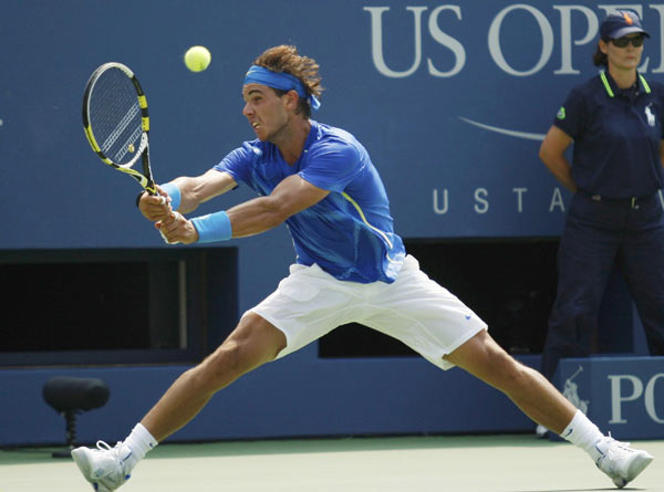 Nadal wins again but felled by cramps at US Open