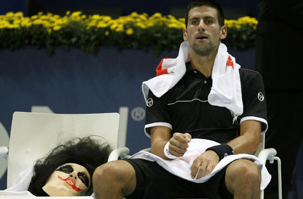 Djokovic the 'Joker' battles through during comeback