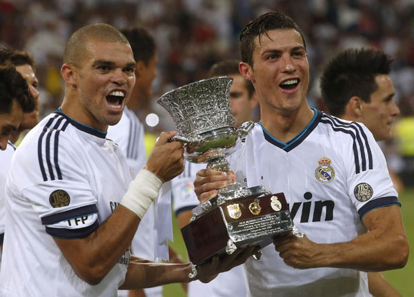 Real comes back to take Super Cup from 10-man Barca