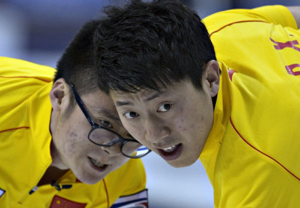 China posts split in opening matches of men's world curling championship