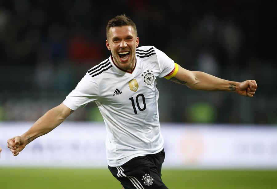 Podolski gets perfect send-off with winning goal for Germany