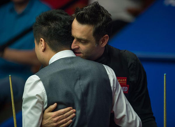 Ding Junhui shocks O'Sullivan to reach semis at snooker worlds