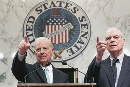 Co-chairmen of the Iraq Study Group former U.S. Secretary of State James Baker (L) and former Rep. Lee Hamilton (D-IN) hold a news conference on recommendations on the Iraq war on Capitol Hill in Washington, December 6, 2006. 