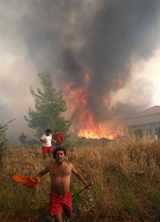 Forest fire out of control near Athens