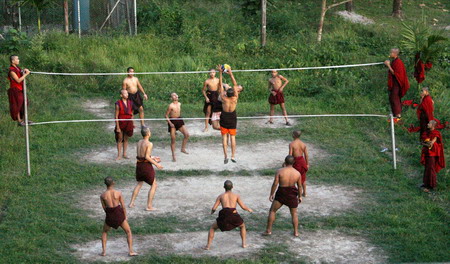Monks play volleyball in Bhutan