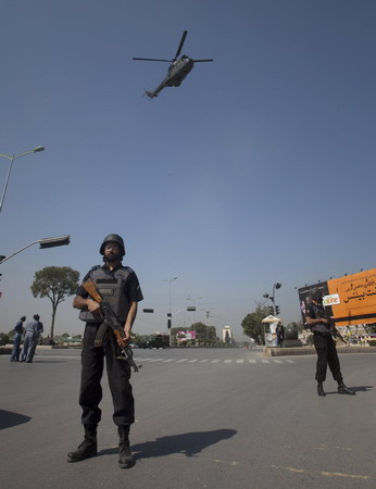 Bloody siege at Pakistan army HQ ends with 19 dead