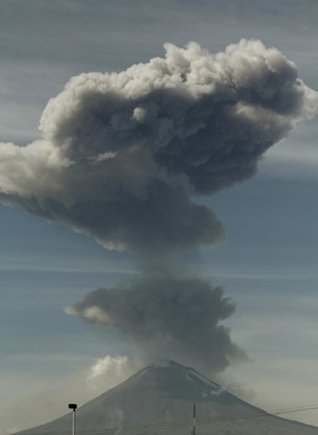 Volcano near Mexico City spews ash, smoke
