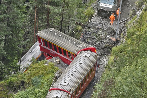 Swiss passenger train derails into ravine, 11 injured