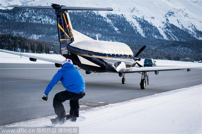 Snowboarder towed by plane reaches speed of 78mph